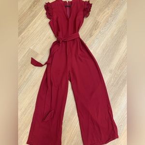 Deep red cap sleeve romper. Never worn